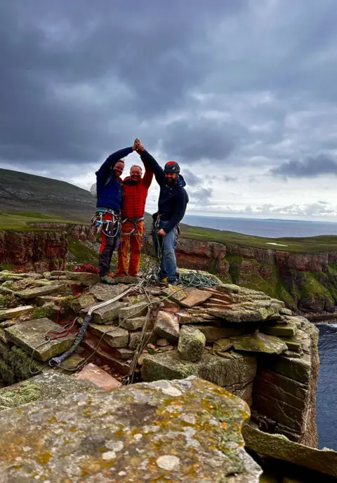 Sascha Kunze Sascha, Darren and Murilo at the top of the climb