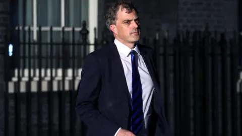 Reuters Newly appointed Northern Ireland Secretary Julian Smith leaves Downing Street