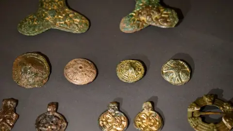 Universal History Archive 9th Century women's brooches