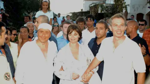 Alamy Tony Blair holidaying with Silvio Berlusconi