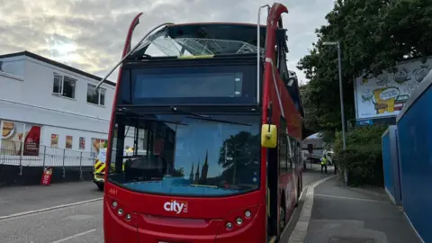 Truro road closures as bus collides with bridge