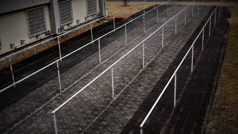 Yo Nagaya  Bars to dry futons on at Tochigi Prison, Japan