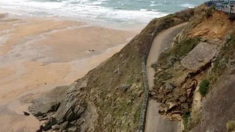 Police Great Western Beach road landslide