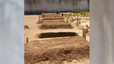 Essimela Ibrahim/BBC Mozambique Island municipal cemetery for adults. Bodies from Monday's disaster are being buried two to a grave.