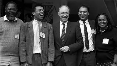 PA Keith Vaz (second from right) with Bernie Grant, Paul Boateng, Neil Kinnock and Diane Abbott at the conference following his election in 1987