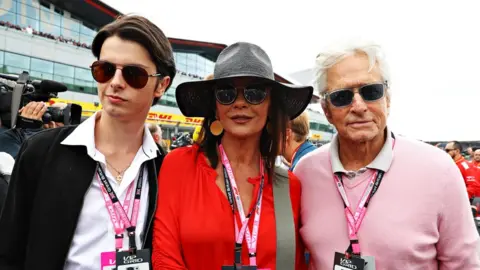 Getty Images Dylan Douglas, Catherine Zeta Jones, Michael Douglas at British F1 Grand Prix at Silverstone in July, 2019