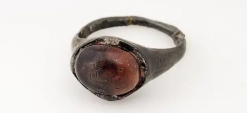 Gabriel Hildebrand/ The Swedish History Museum Viking ring with Kufic inscription "for Allah"