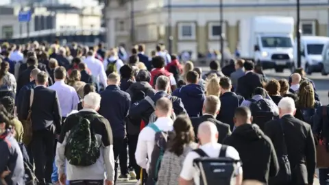 Getty Images File image showing a large crowd of people commuting to work in London