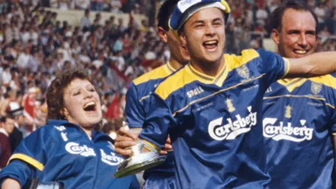 Caroline Brouwer celebrates with Dennis Wise and Alan Cork