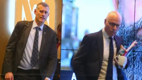 EPA John Lyons, ABC's executive editor, and an Australian police officer