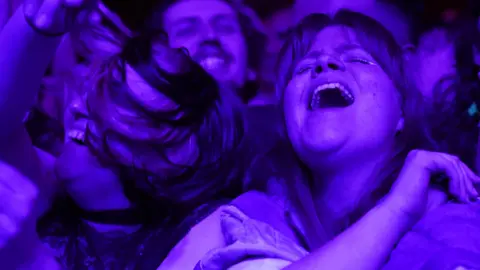 Getty Images Fans at Sefton Park gig in Liverpool