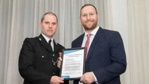 Devon and Cornwall Police Close up of chief superintendent Matt Longman and Ryan Hammond