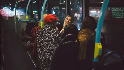 Getty Images Women on a night bus