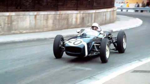 Getty Images Stirling Moss driving a Lotus 18
