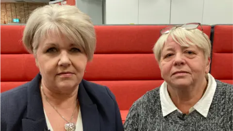 BBC Former post branch managers Nicki Arch and Wendy Buffrey are sat down and looking at the camera