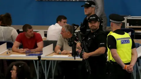 Nigel Roddis/PA Wire Police at Sunderland count