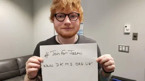 DKMS Ed Sheeran holds up the #John for Jasmi poster