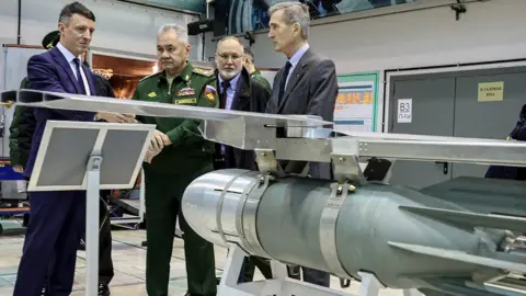 Shutterstock Russian Defence Minister Sergei Shoigu visiting a Russian missile factory last month