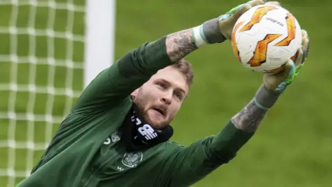Scott Bain makes a save in Celtic training