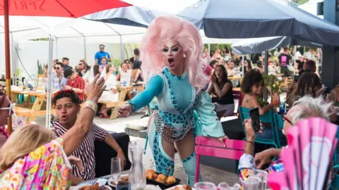 Getty Images A drag performer performs at a Florida restaurant