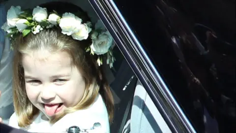 WPA Pool Princess Charlotte sticks out her tongue on her way to the wedding of Prince Harry and Meghan Markle