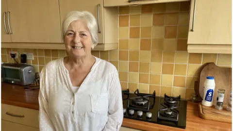 BBC Woman in a kitchen