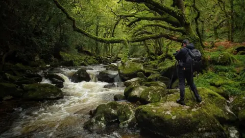 Dave Shaw Dave taking photos by a river