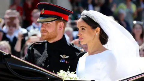 PA Meghan Markle and Prince Harry