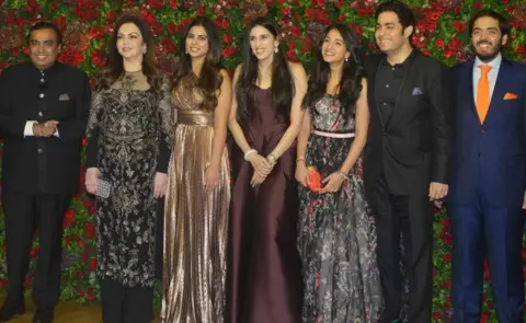 Getty Images Mukesh Ambani, Nita Ambani, Isha Ambani, Anant Ambani and Akash Ambani at Ranveer Singh and Deepika Padukone's reception in Mumbai.