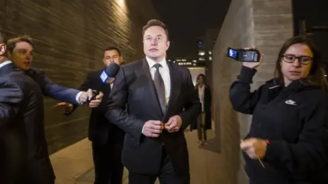 Getty Images Elon Musk, chief executive officer of Tesla Inc, leaving court on Tuesday