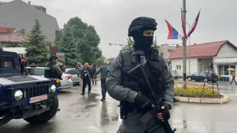 Getty Images A Kosovan police officer