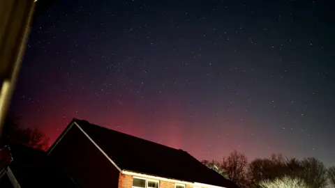 Owen Rhys Meredith pink northern lights in south wales