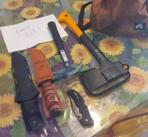 Anna White Bag of weapons photographed on table