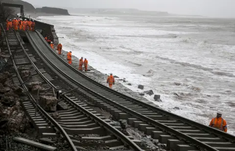 Getty Images The railway line at Dawlish damaged by a storm