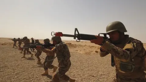 Troops from the Afghan National Army undergo training in Helmand province, Afghanistan