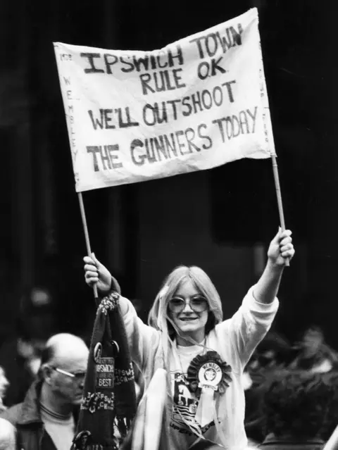 Evening Standard/Getty Images An Ipswich Town supporter cheering on her team during the FA Cup Final match against Arsenal.