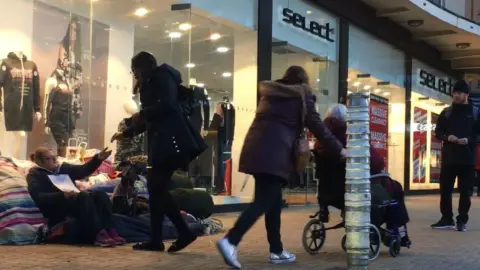 BBC A homeless woman in Bristol's Broadmead shopping centre received a notice giving her 24 hours to move