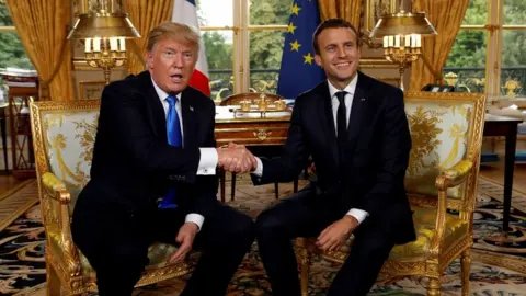 Reuters Donald Trump and Emmanuel Macron