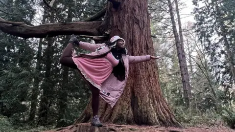 Dominique Plamer Dominique balancing on a tree stump