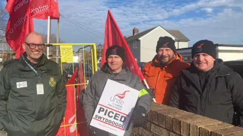 Striking workers in Llanelli