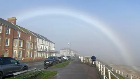 BBC Weather Watchers/WhateverTheWeather Fogbow over the promenade at Southwold in Suffolk