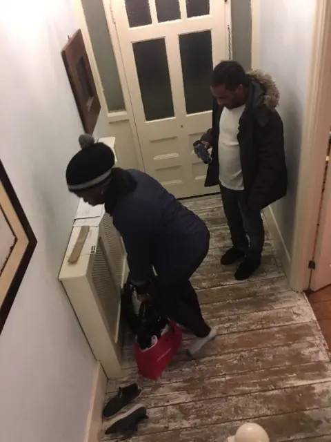 AFP Matovu and Dunbar leave house of a victim