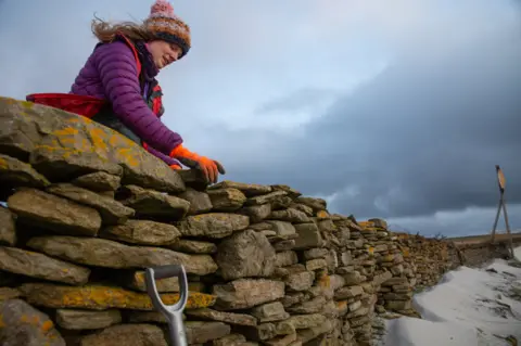 BBC Sian Tarrant and the wall