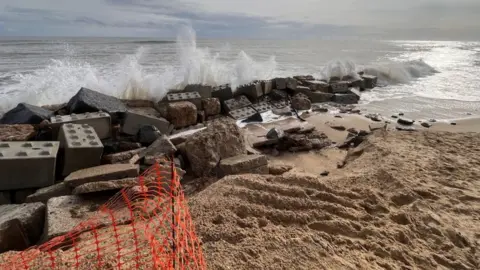 Edd Smith/BBC granite blocks on Hemsby beach