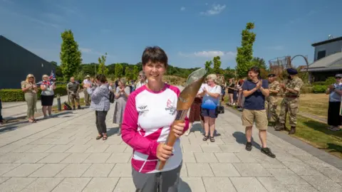 Getty Images Jo Yendole takes part in The Queen's Baton Relay as it visits The World of Wedgwood