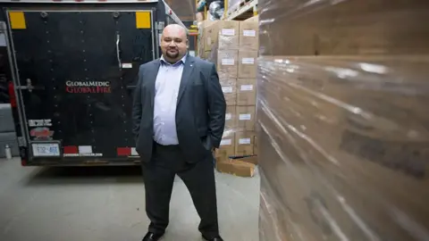 Toronto Star via Getty Images Rahul Singh, creator of GlobalMedic, at their facility