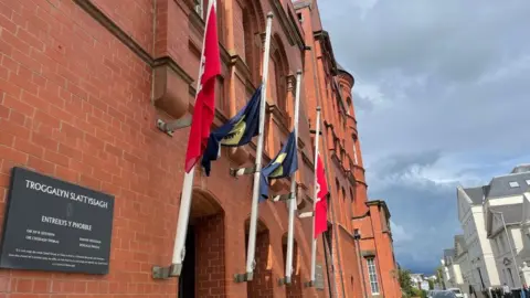 Flags flying at half mast