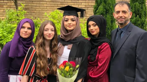 Family photo Amani, with her mother. Yasmin and sisters Meah, Ruqayyah and father Khuram on her graduation day