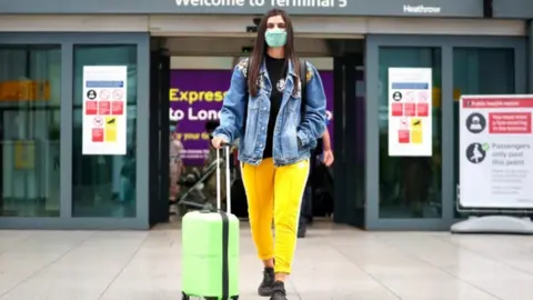 Getty Images Woman at UK airport