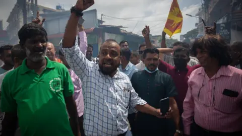 Getty Images Supporters of Ranil Wickremesinghe celebrate